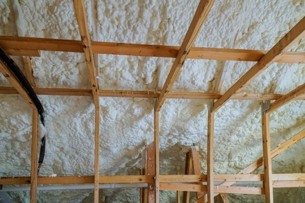 Insulation of attic with foam insulation cold barrier and insulation material polyurea Spraying, foam coating